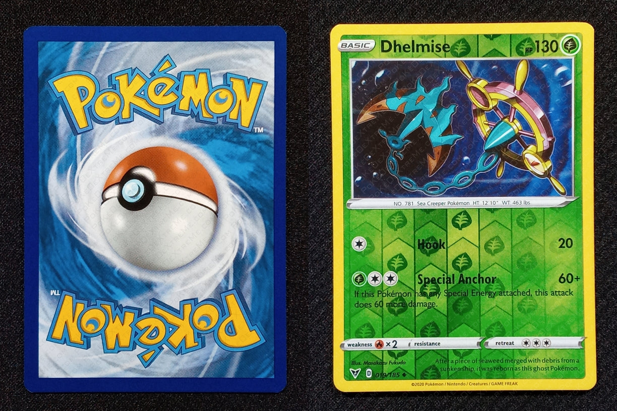019/185 Dhelmise {Reverse Holo}