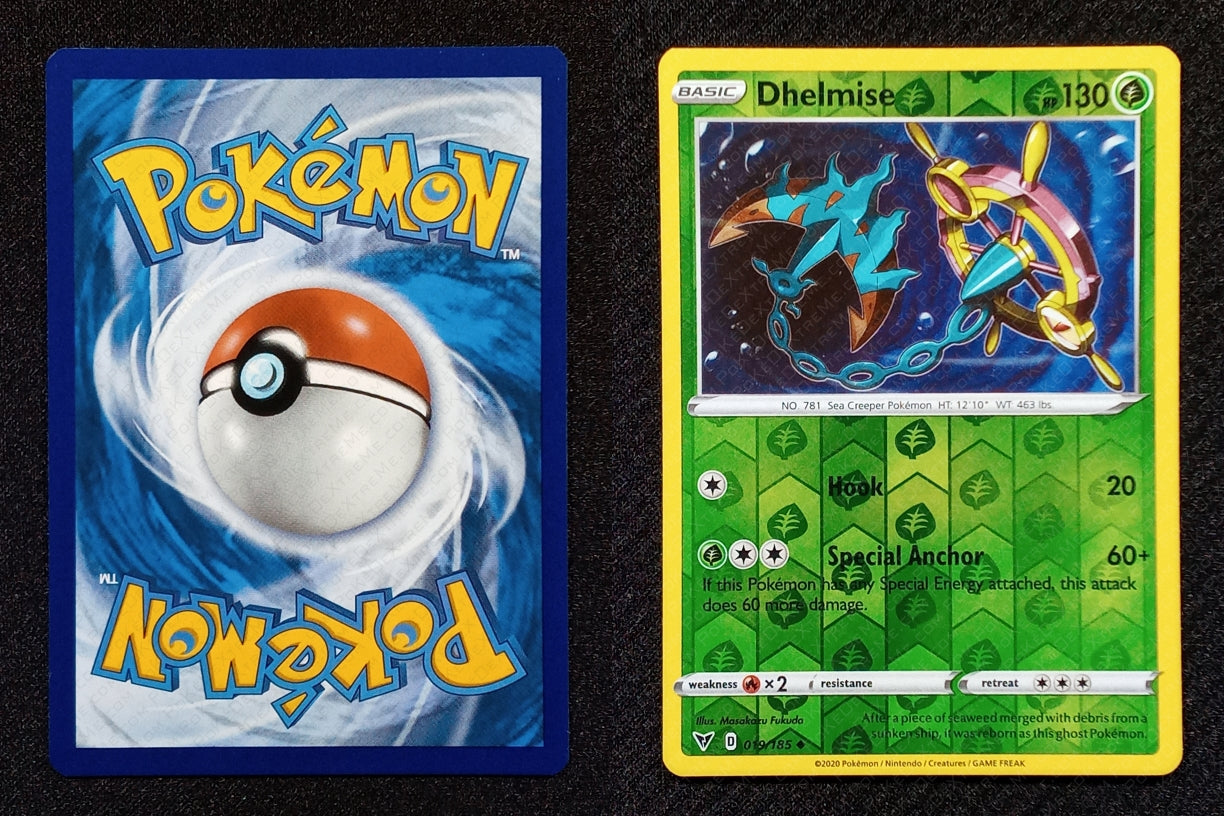 019/185 Dhelmise {Reverse Holo}