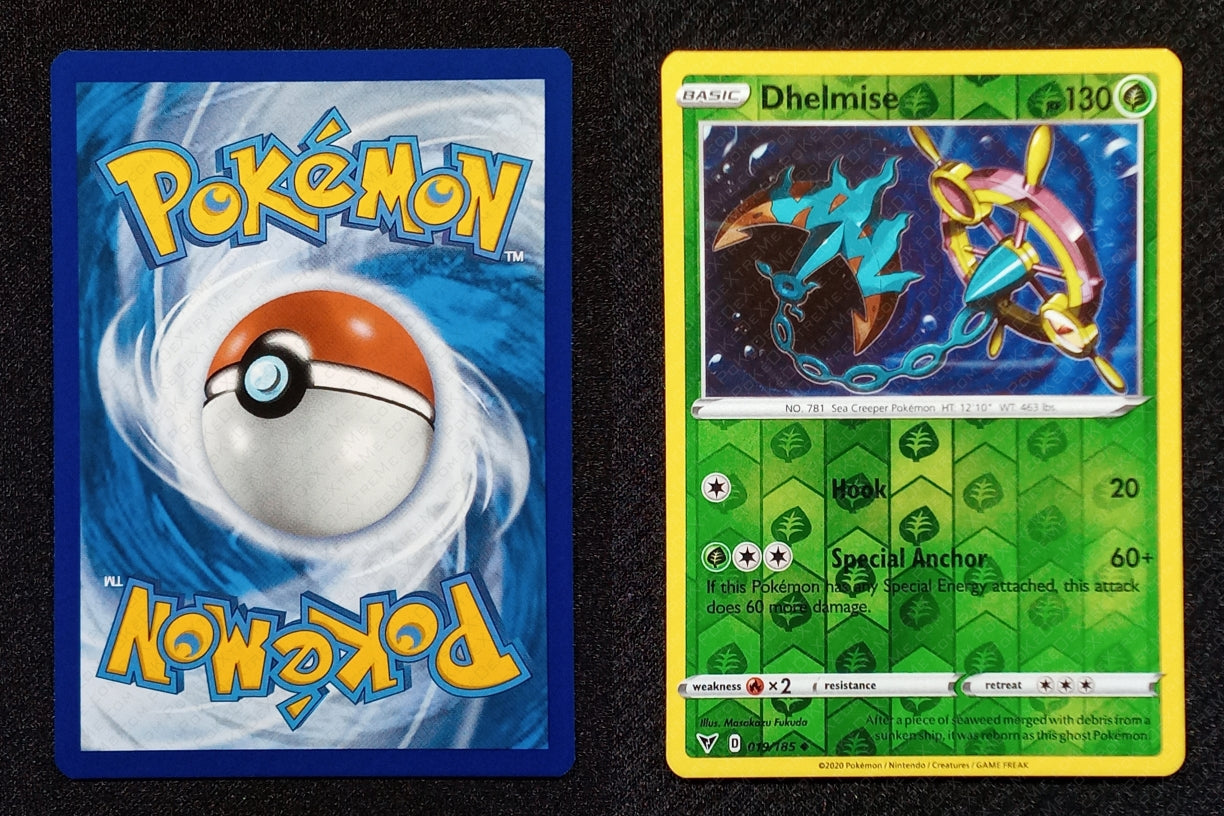 019/185 Dhelmise {Reverse Holo}