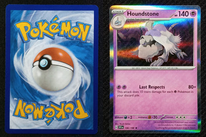 106/198 Houndstone {Regular Holo}